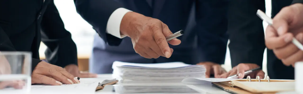 Man pointing a contract law documents